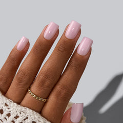 BTArtbox press-on nails square solid pink short on-hand application demonstrates natural fit