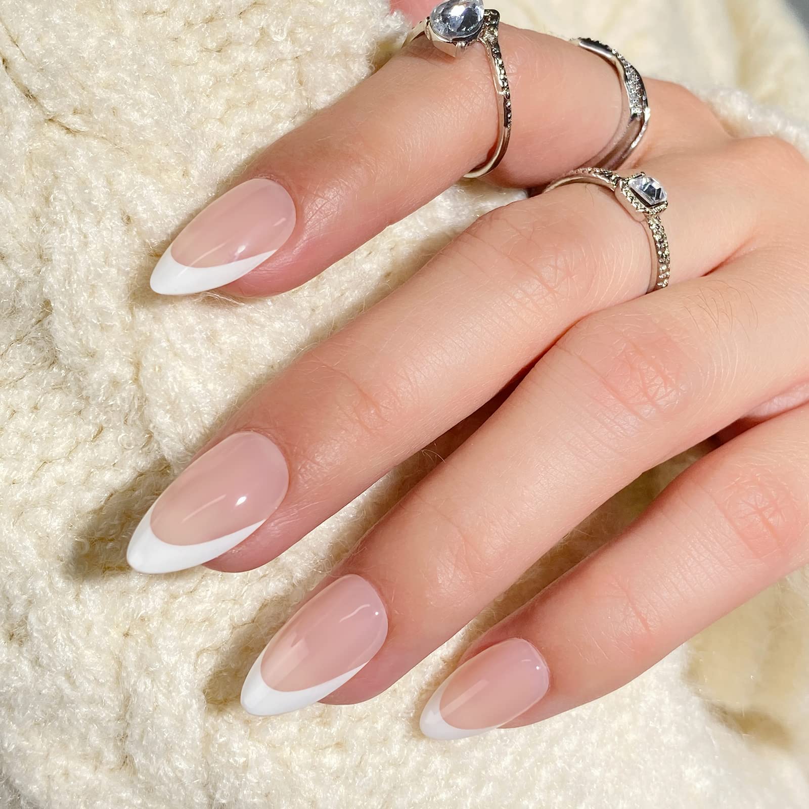 BTArtbox short almond French tip nails on hand showcase natural look and comfortable wear.