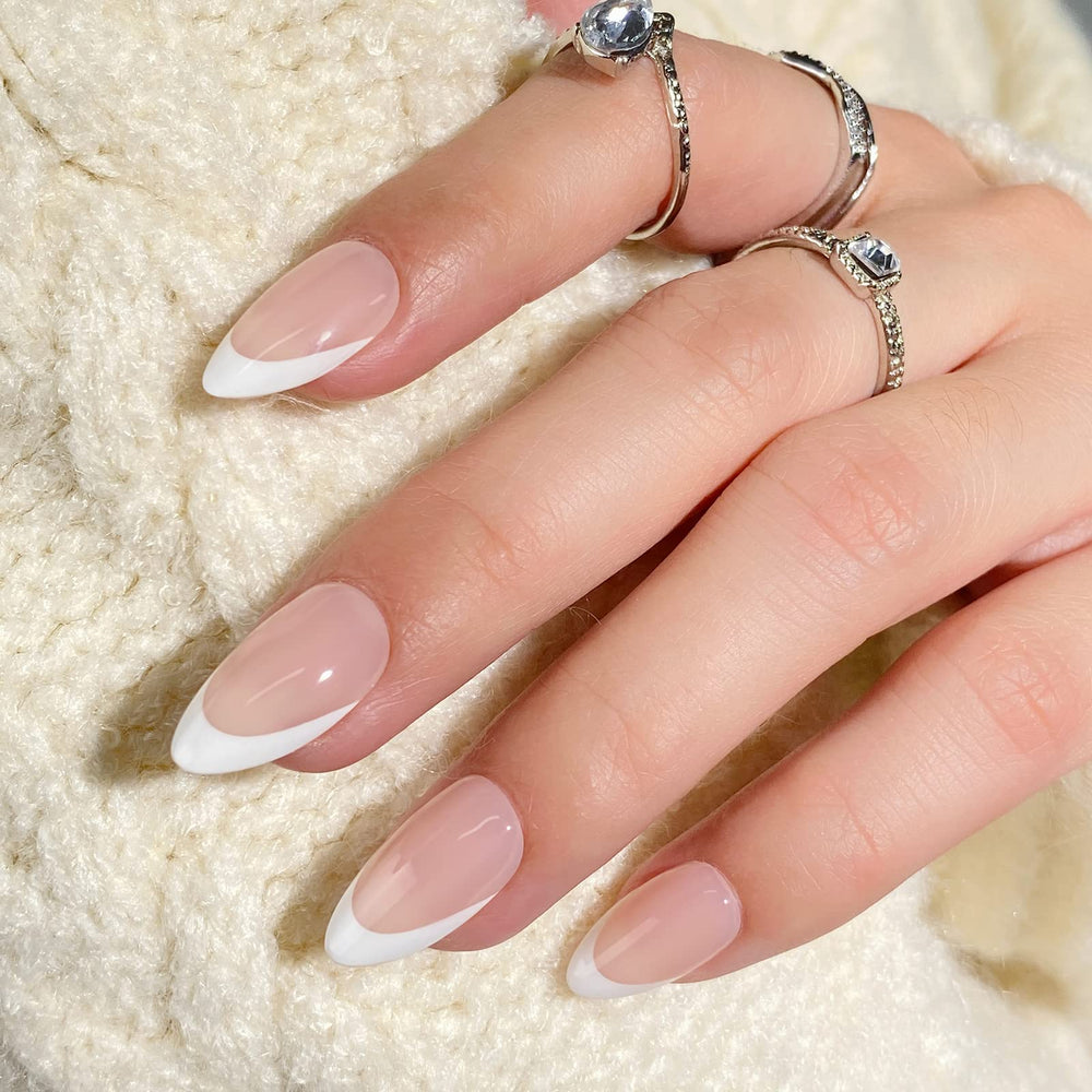 BTArtbox short almond French tip nails on hand showcase natural look and comfortable wear.