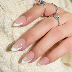 BTArtbox short almond French tip nails on hand showcase natural look and comfortable wear.