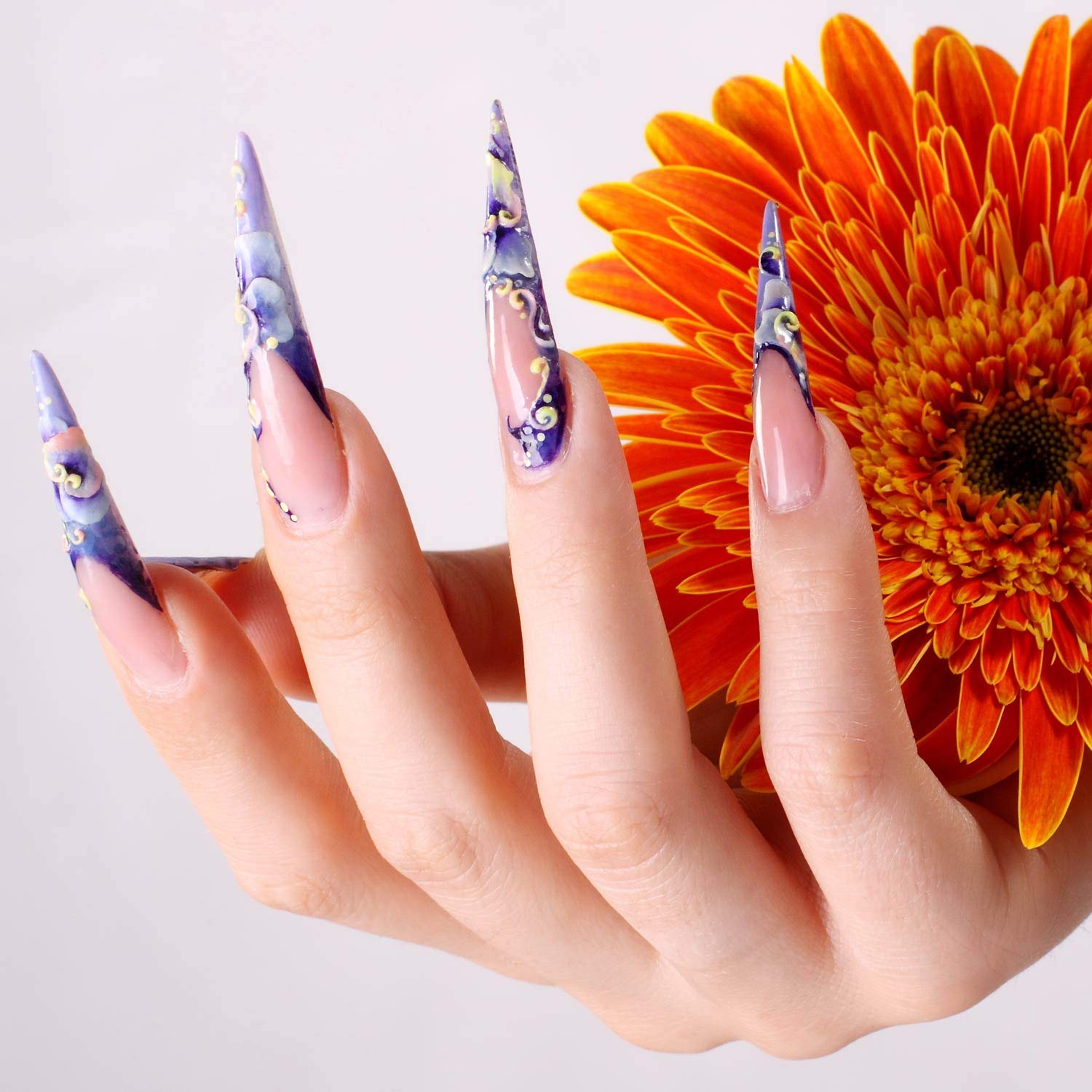 BTYMS clear stiletto nails provide a natural look for versatile styling.