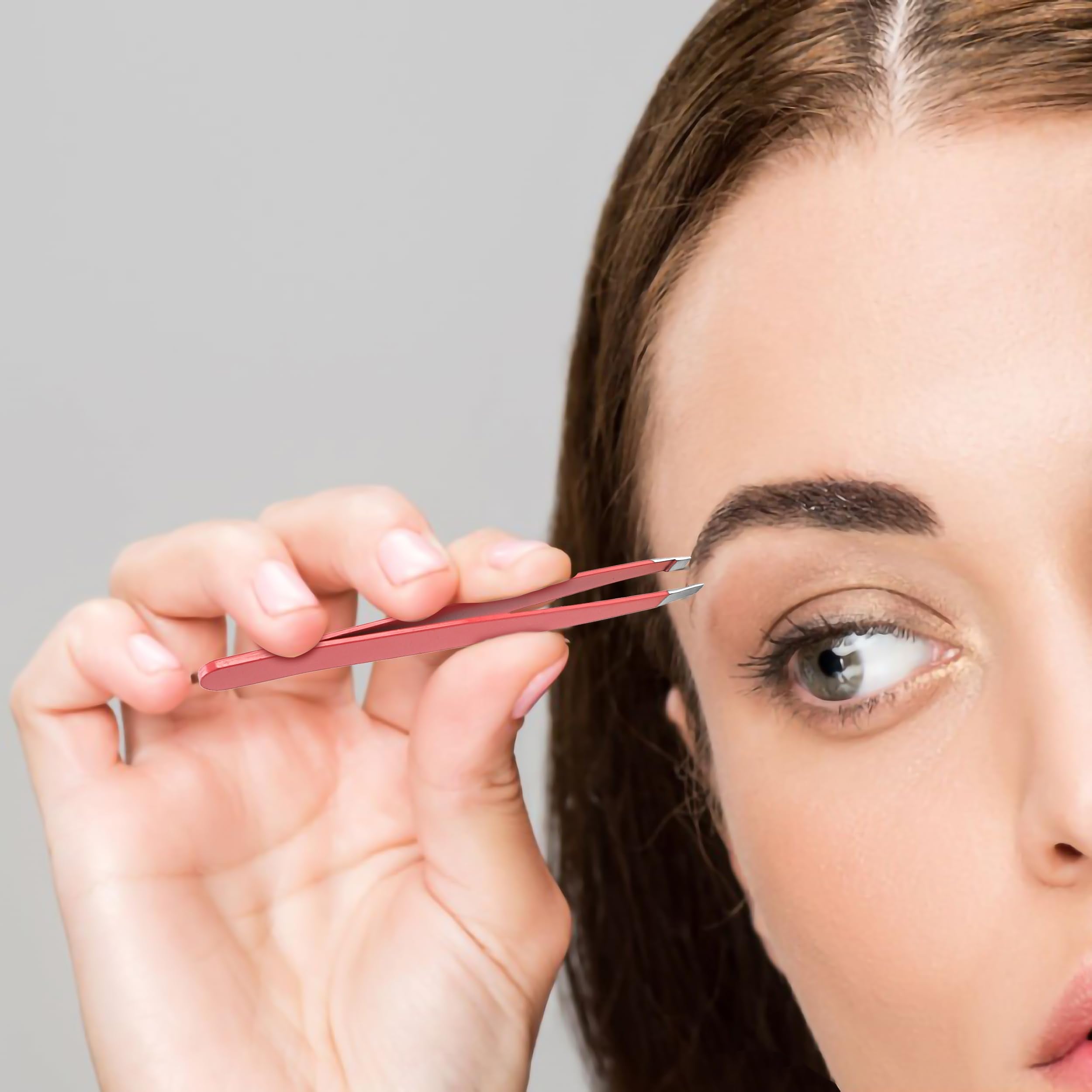 BuleVina pink bling tweezers for precise lash grooming.