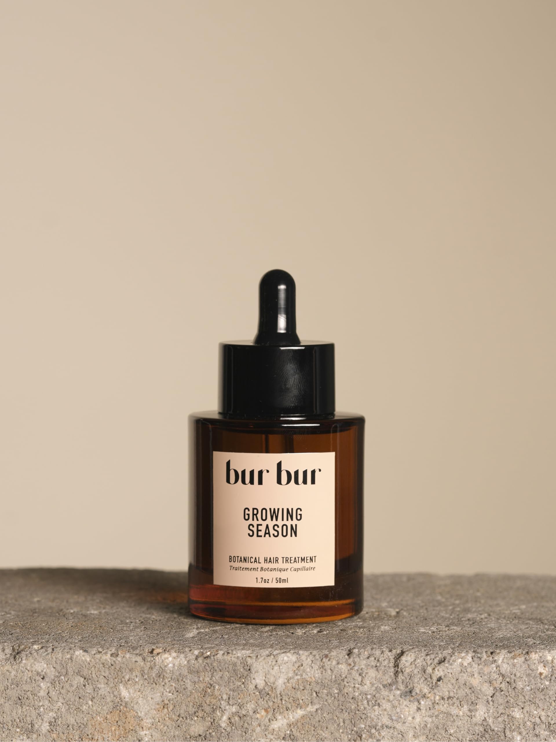 Bur Bur Growing Season Oil bottle ready for scalp nourishment and hair strength.