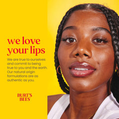 Burt's Bees applying balm to lips for instant softening and protection