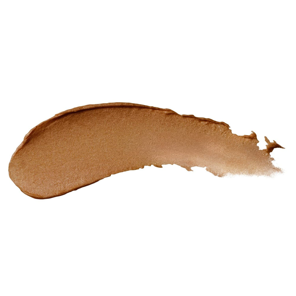 Burt's Bees bronzer on the cheekbone highlights a soft glow.