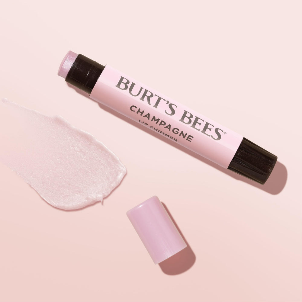 Burt's Bees Natural-origin label on lip shimmer packaging.