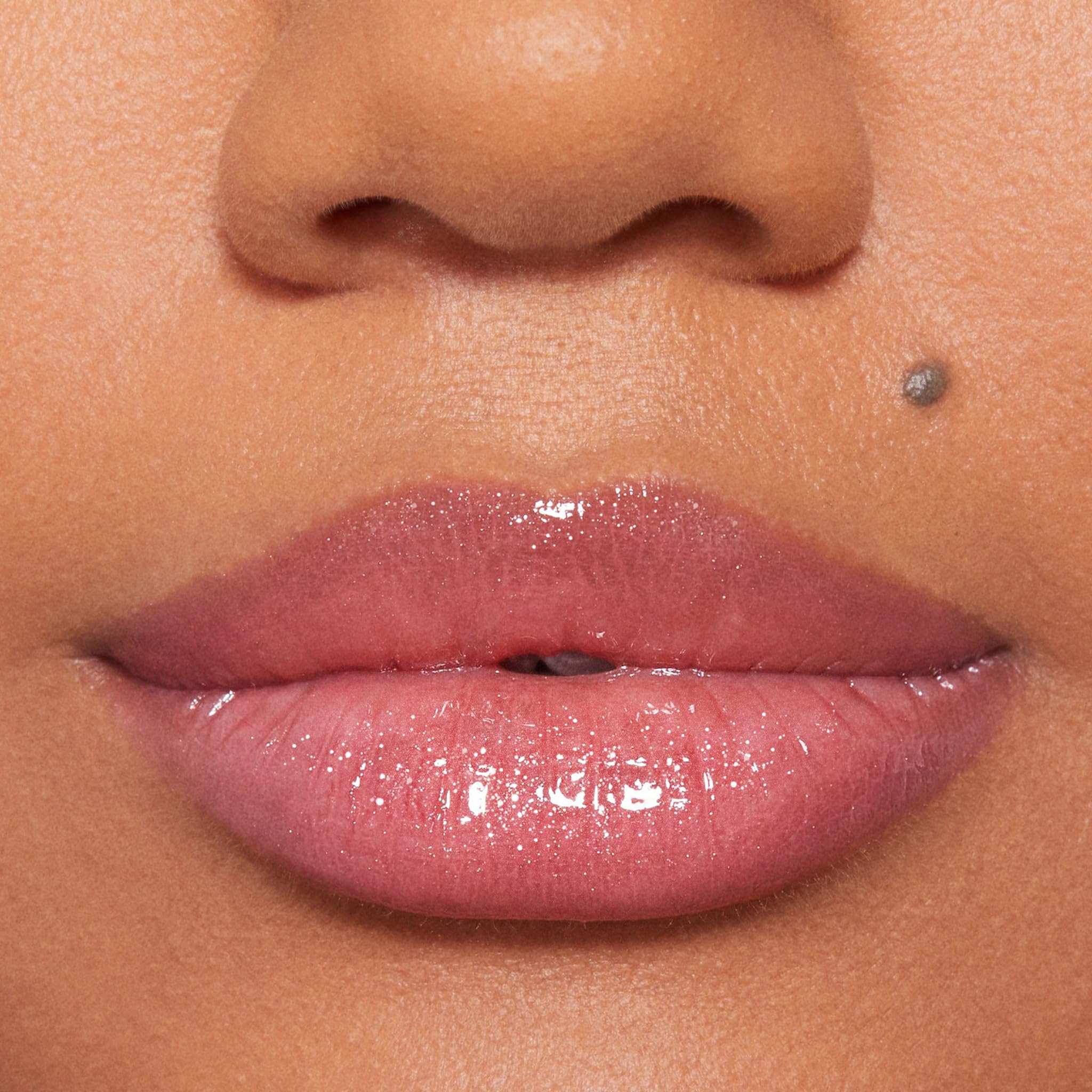 BUXOM Dolly layered over lip liner provides bold definition.