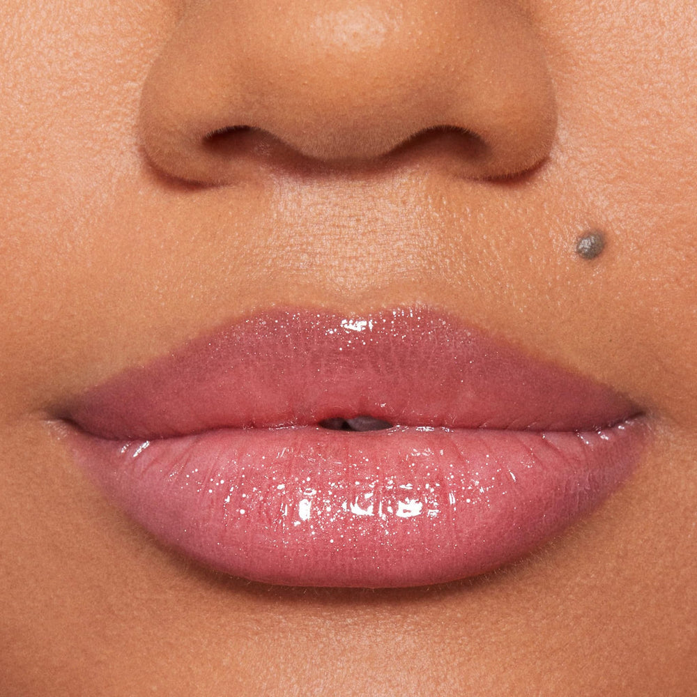 BUXOM Dolly layered over lip liner provides bold definition.