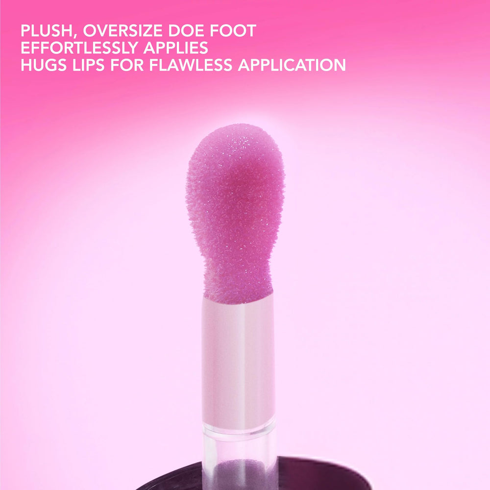Berry Blast gloss oil on lips for instant shine and hydration.