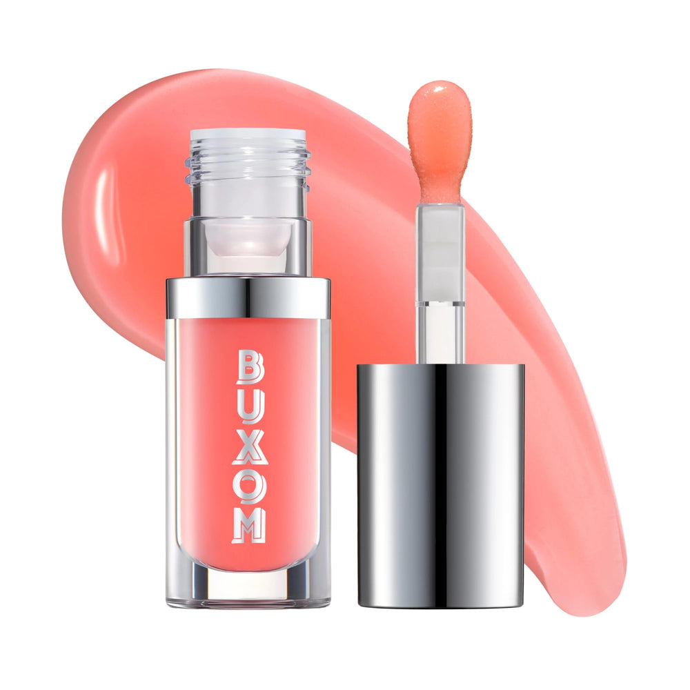 Buxom Full-On Glossy Lip Oil Trixie packaging close-up shows premium hydration and sleek design.
