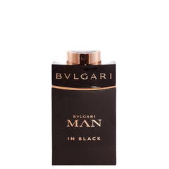 BVLGARI Man in Black bottle close-up highlighting rich amber spice notes.