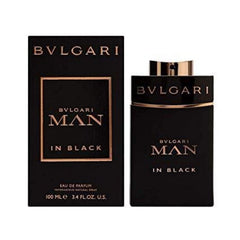 BVLGARI Man in Black cap detail showing luxury branding.
