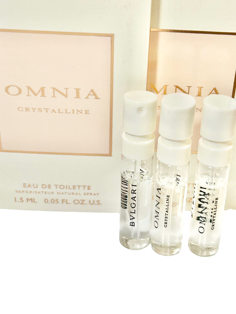BVLGARI Omnia Crystalline vial-closeup highlights portable scent for daily touch-ups.