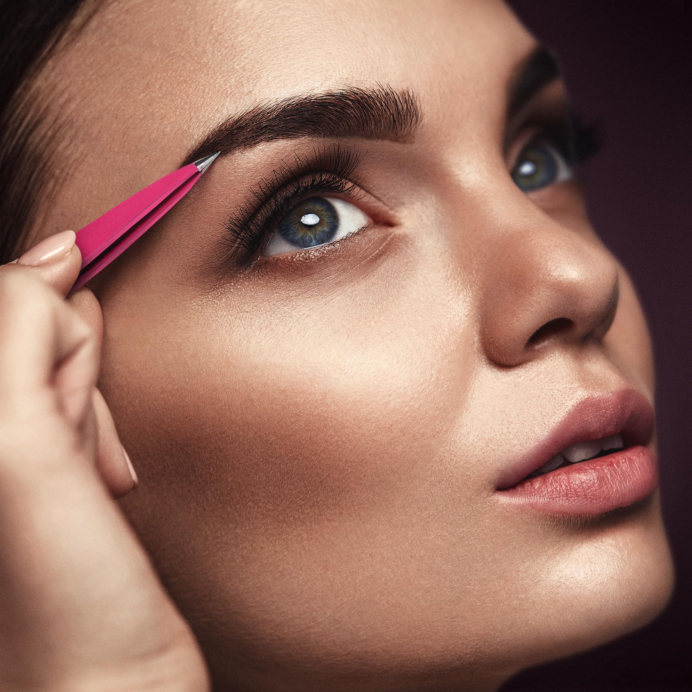 By MILLY pointed tweezers pink in-use grip for control.