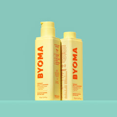 BYOMA jelly cleanser creating light, creamy lather on wet skin