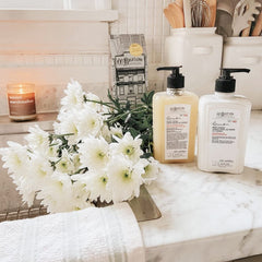 C.O. Bigelow Lemon Hand Wash liquid pour shows smooth stream for controlled cleansing.