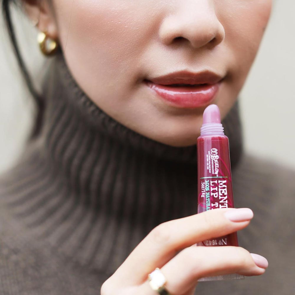 C O Bigelow lip tint tube closeup highlights purple tint and peppermint oil benefits