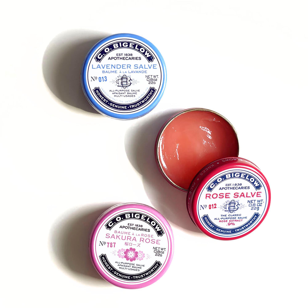 C.O. Bigelow travel-size salve tins in compact box for convenience.