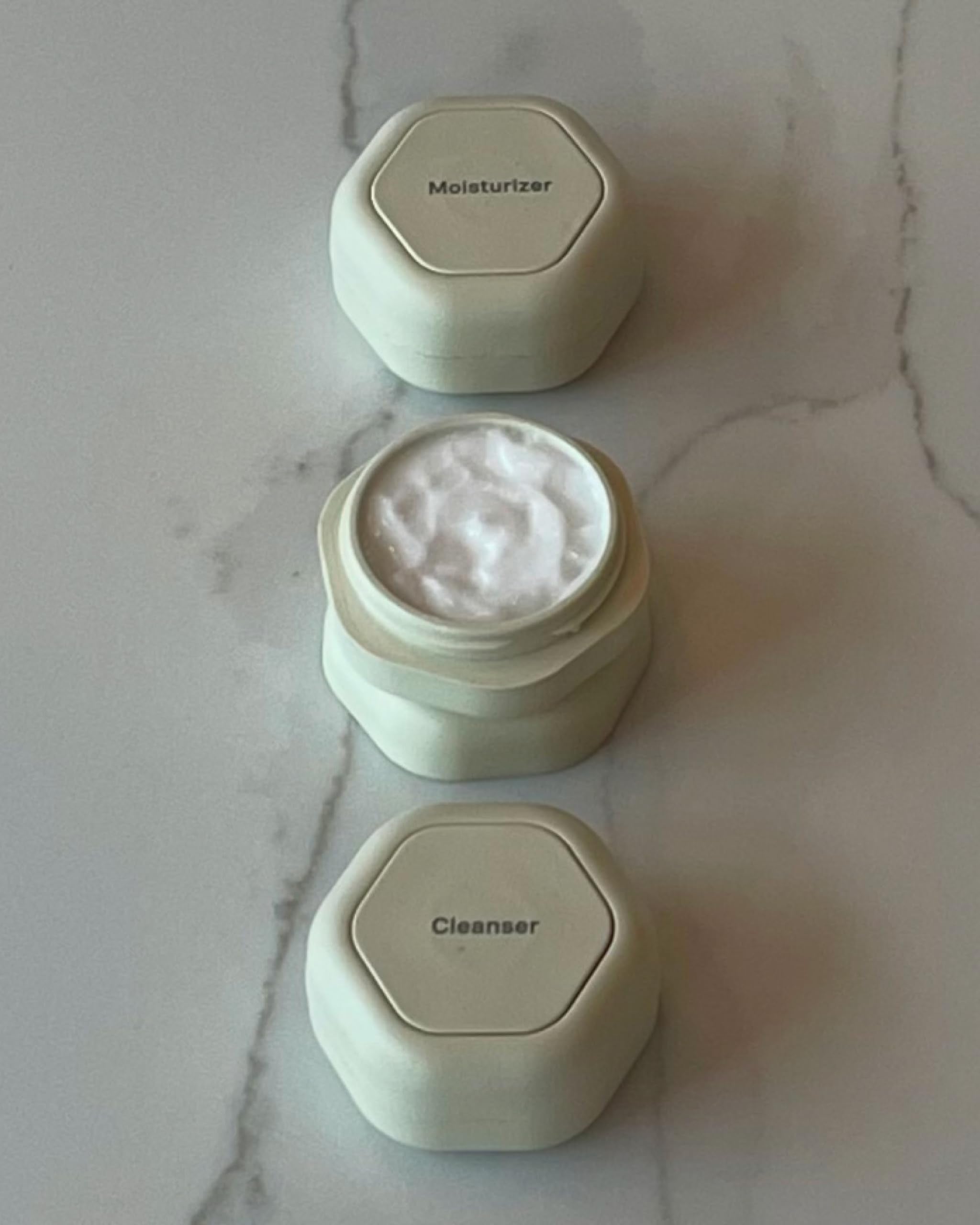 Cadence travel skincare capsules leak-proof cap prevents spills during trips.