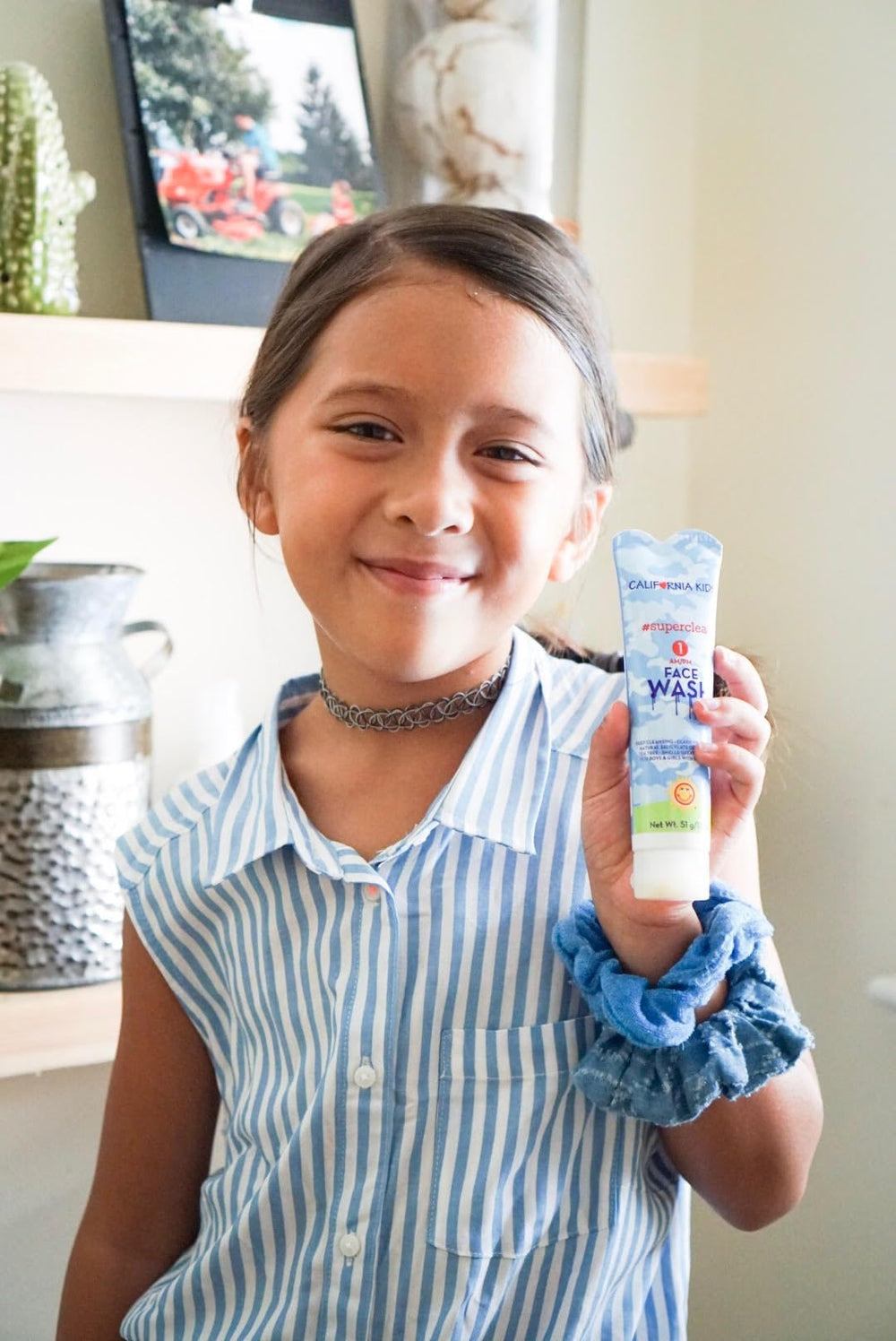 California Baby gentle exfoliating foaming lather shows daily cleansing for kids and teens.