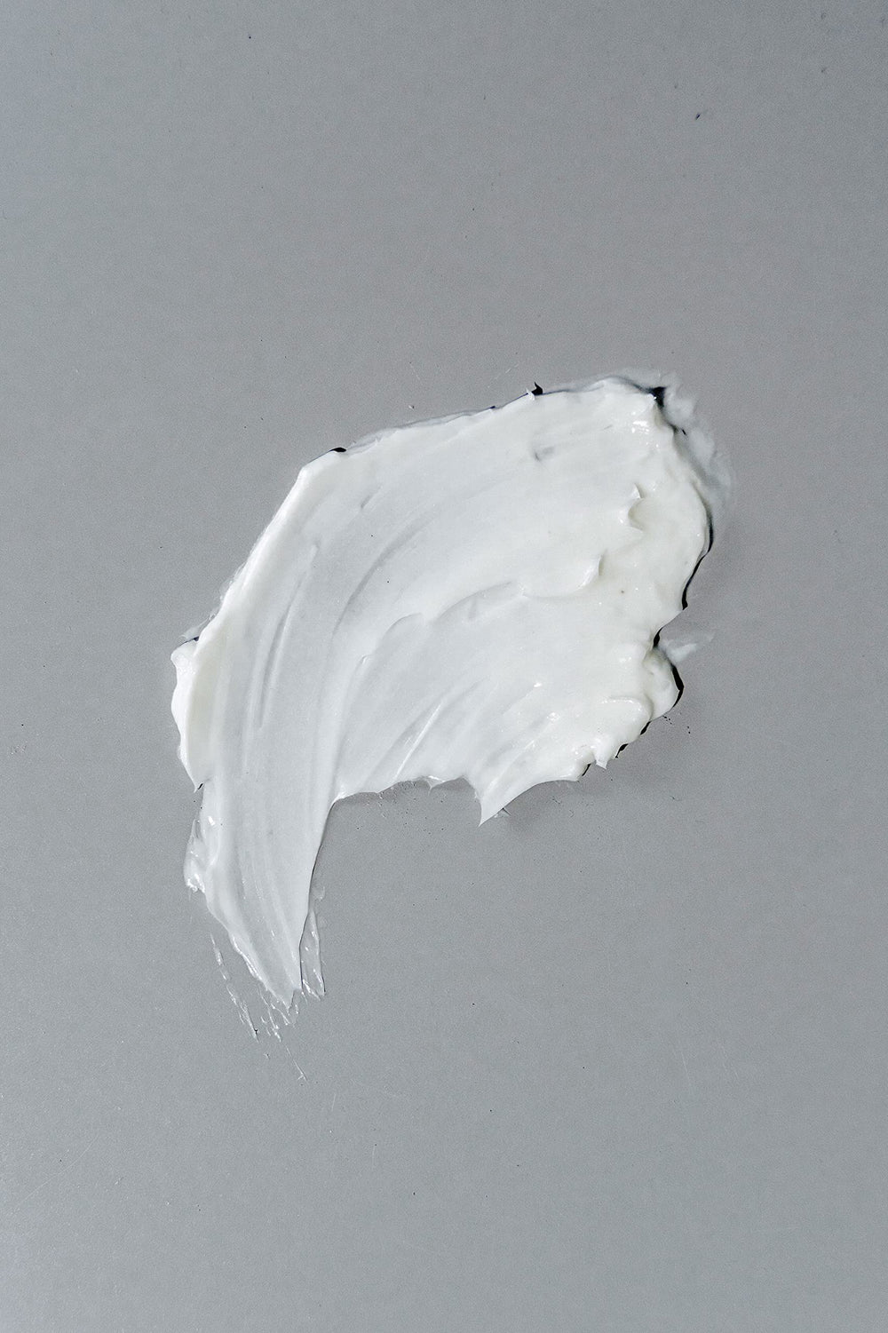 California Born Days of Dirt cream tube closeup for travel-friendly styling on the go.