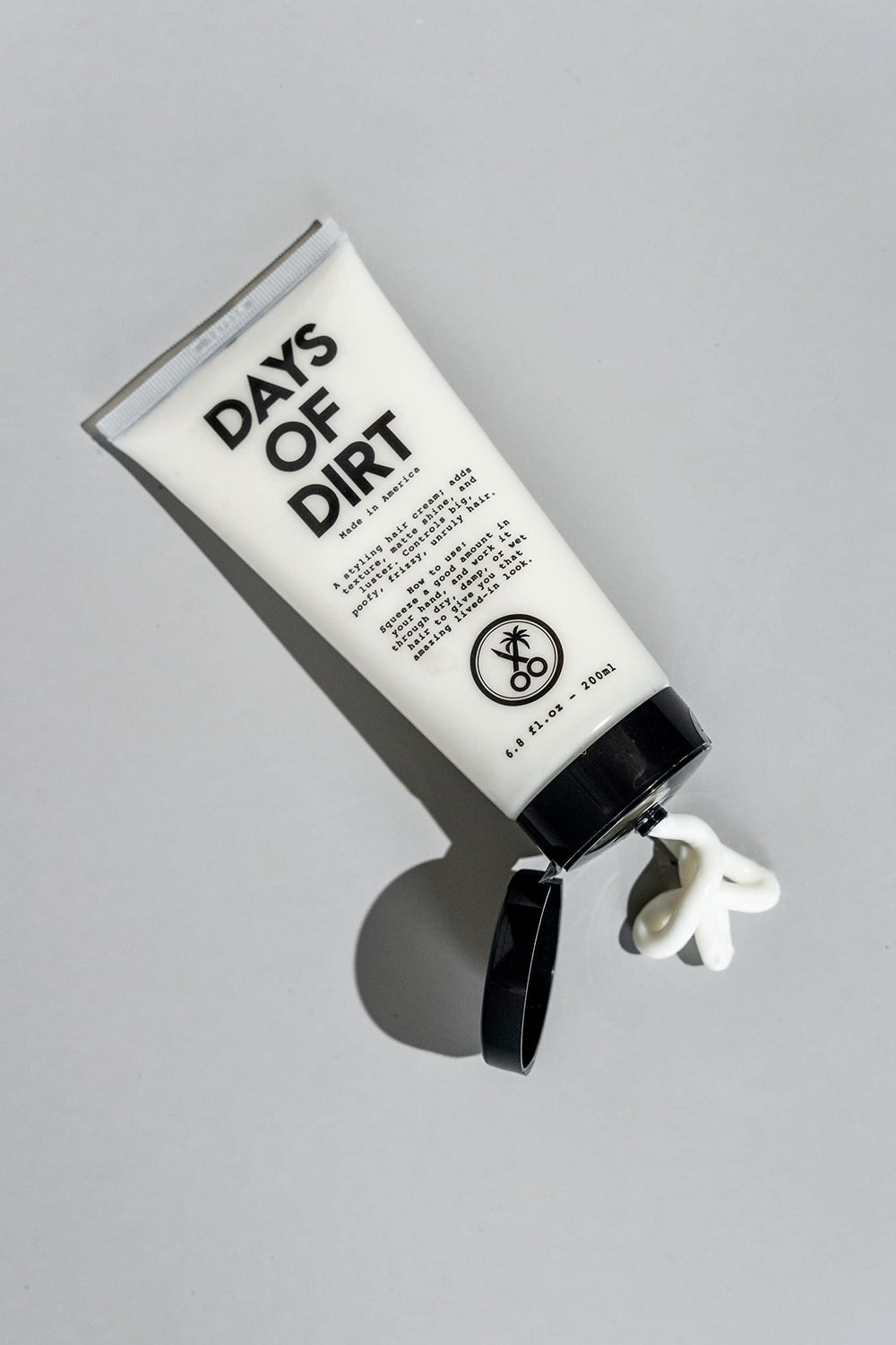 California Born Days of Dirt frizz-control image demonstrates smooth, manageable hair.