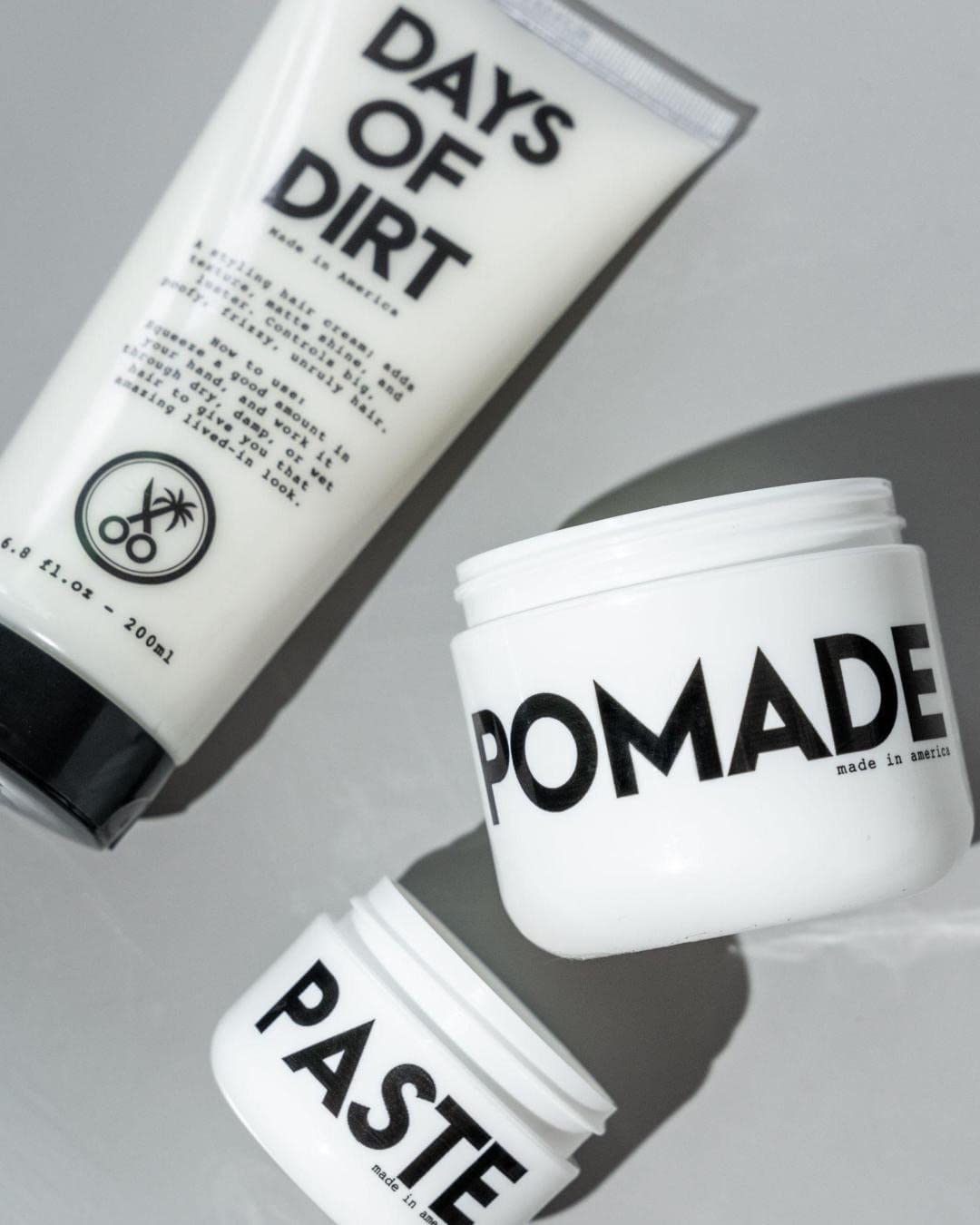California Born Days of Dirt hair-gloss image emphasizes subtle shine and health.
