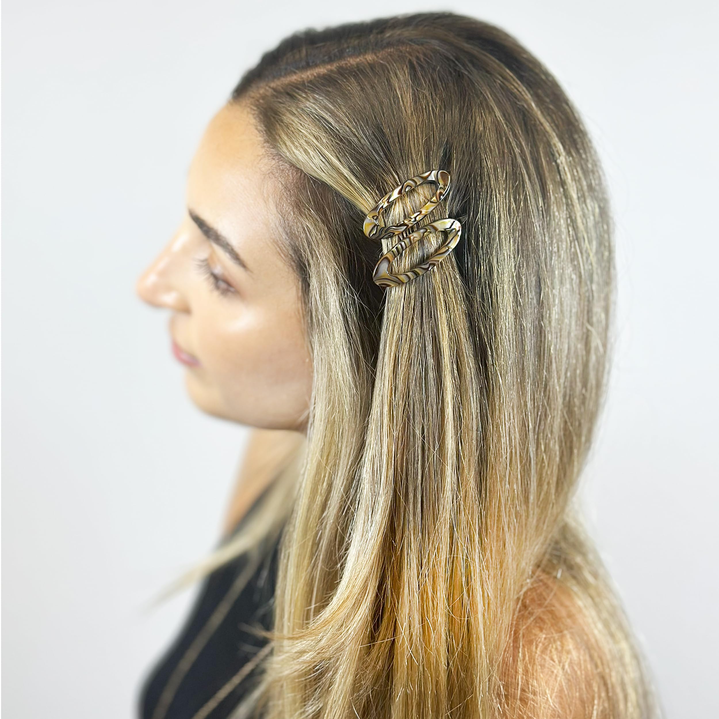 Camila Paris CP3367 onyx barrette close-up texture showcases durable finish.