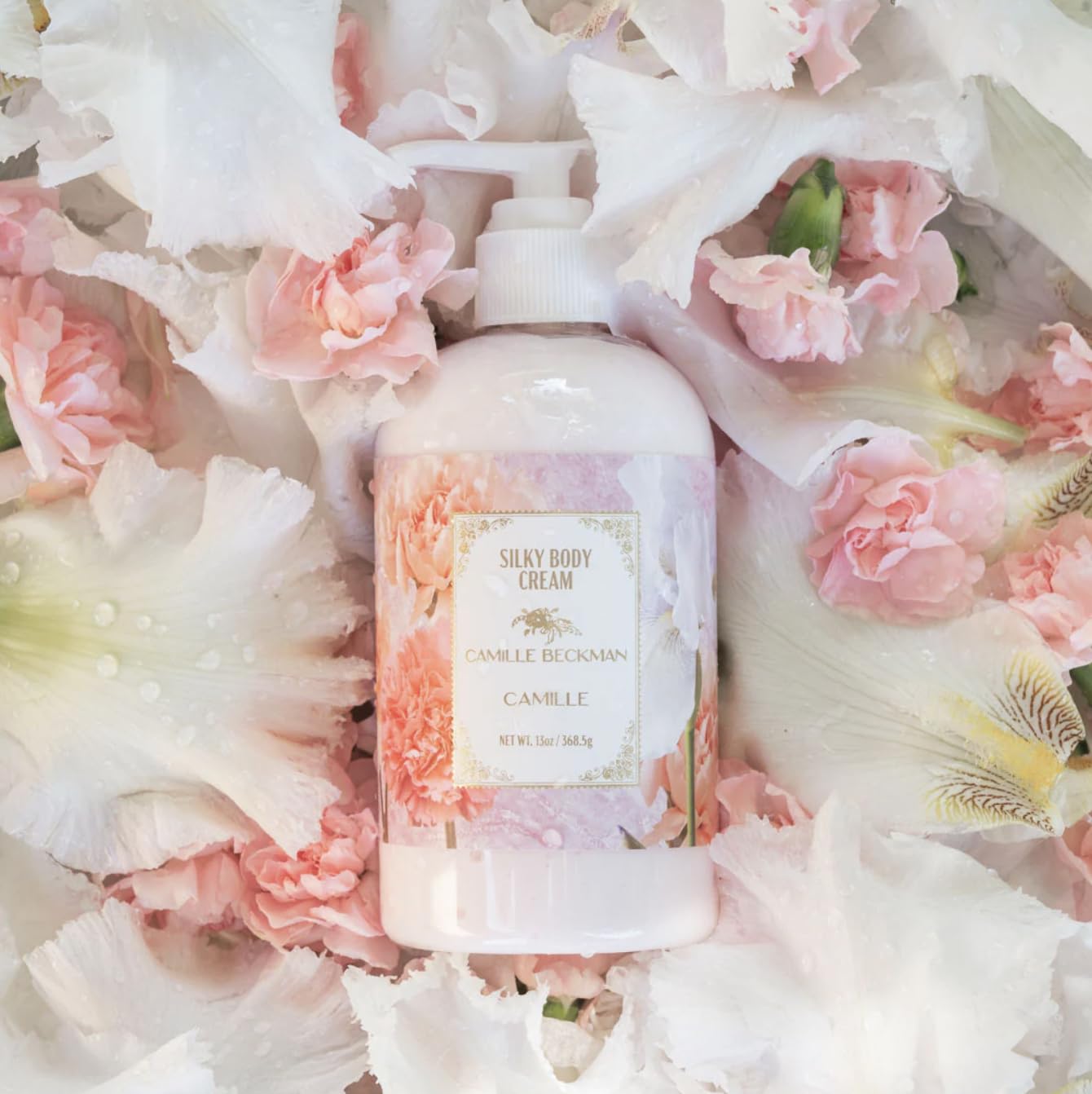 Camille Beckman Camille Scented Silky Body Cream pump-dispense demonstrates non-greasy daily moisturization.