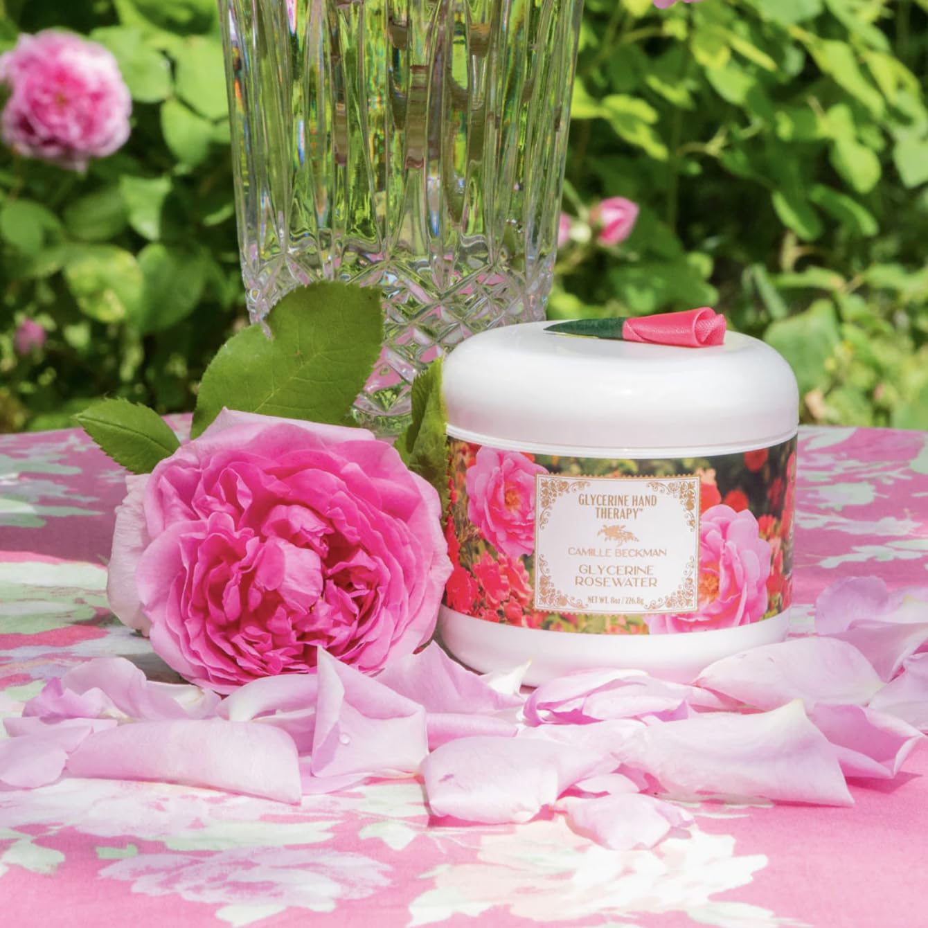 Open tub reveals rich cream perfect for hand renewal.
