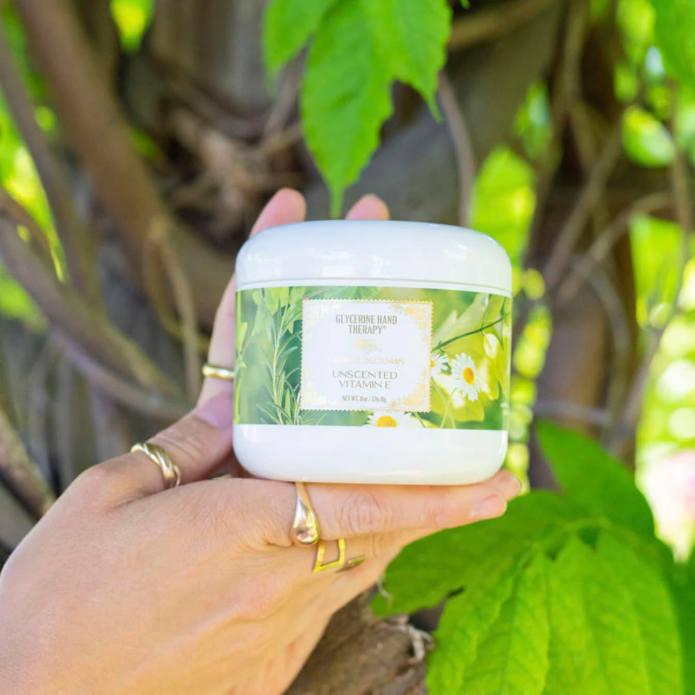 Camille Beckman close-up shows skin-softening cream texture.