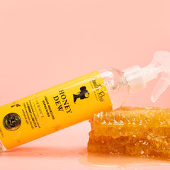 Camille Rose Honey Dew Liquid Moisture close-up showing glossy curls.