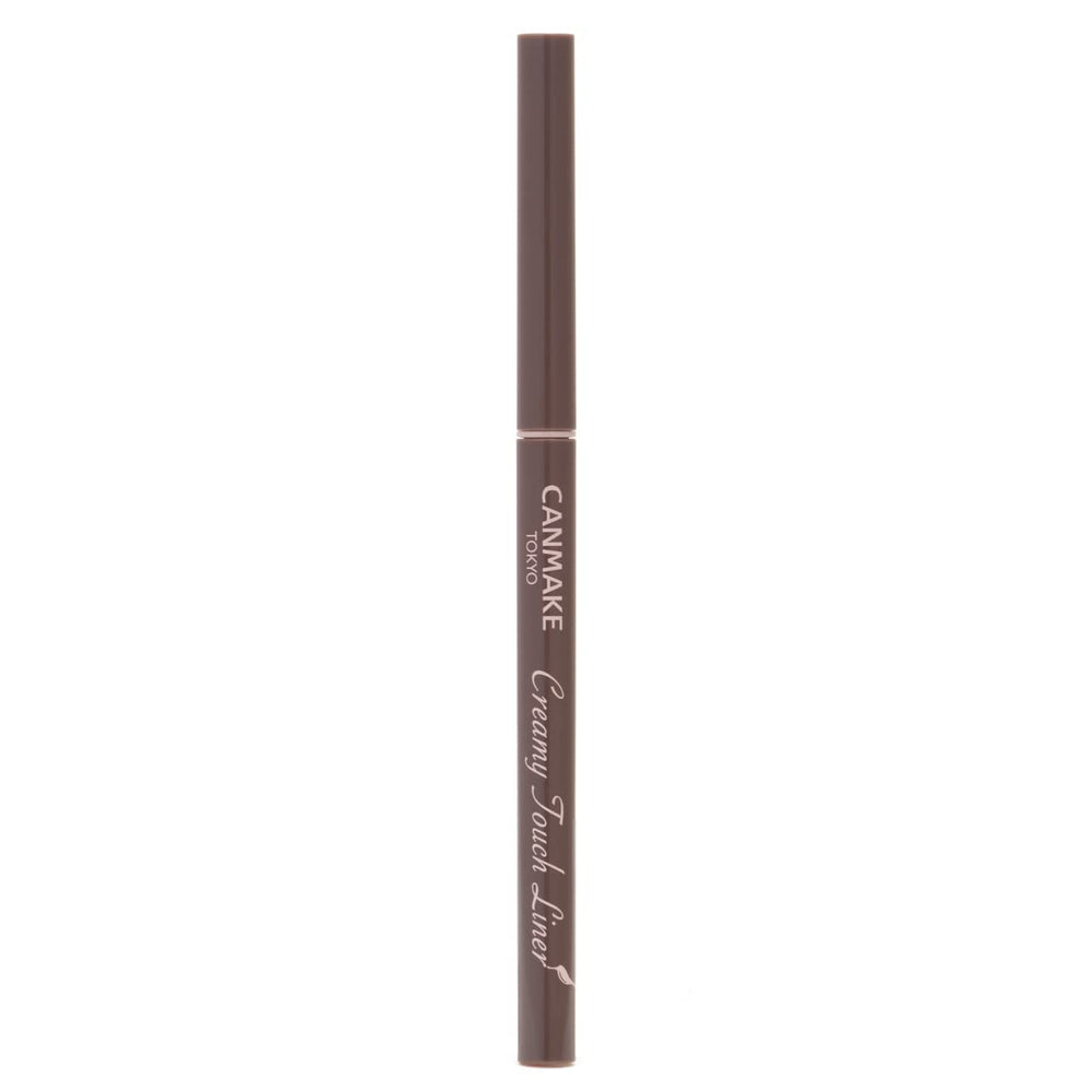 CANMAKE Creamy Touch Liner cap close-up in Cloudy Gray for precise control.