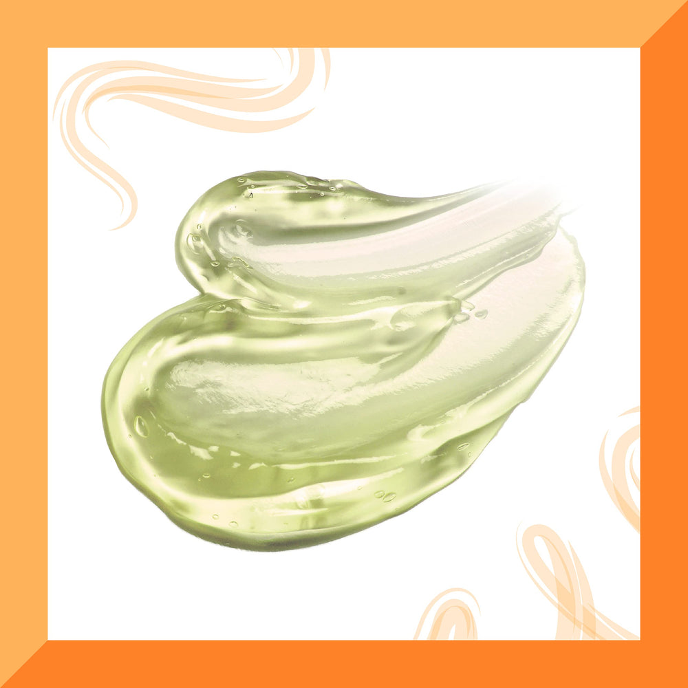 Cantu curl definition with gentle shine is captured in this close-up.