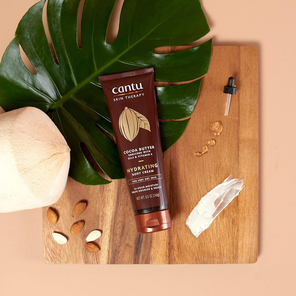 Cantu Therapy Cocoa Butter Body Cream on rough skin areas provides targeted softness