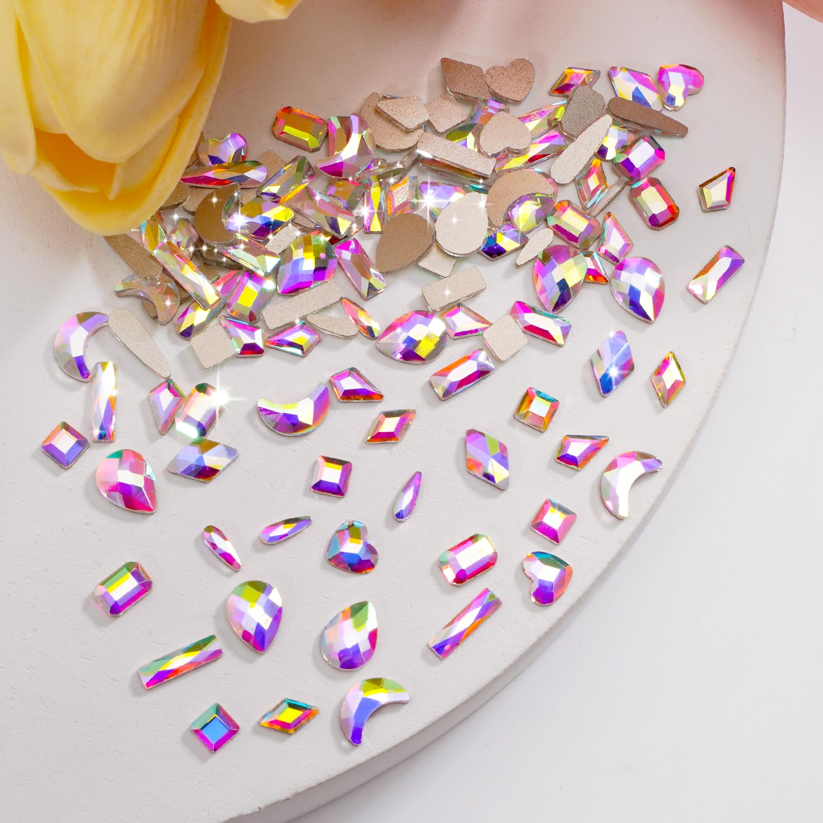 CANVALITE 12-shape nail jewels inspire creative DIY designs.