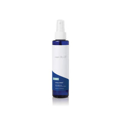 Capri Blue Volcano dry oil spray bottle showing fast-absorbing hydration and signature scent.