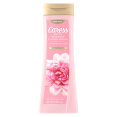 Caress Daily Silk lather close-up highlighting rich foam and fragrance.