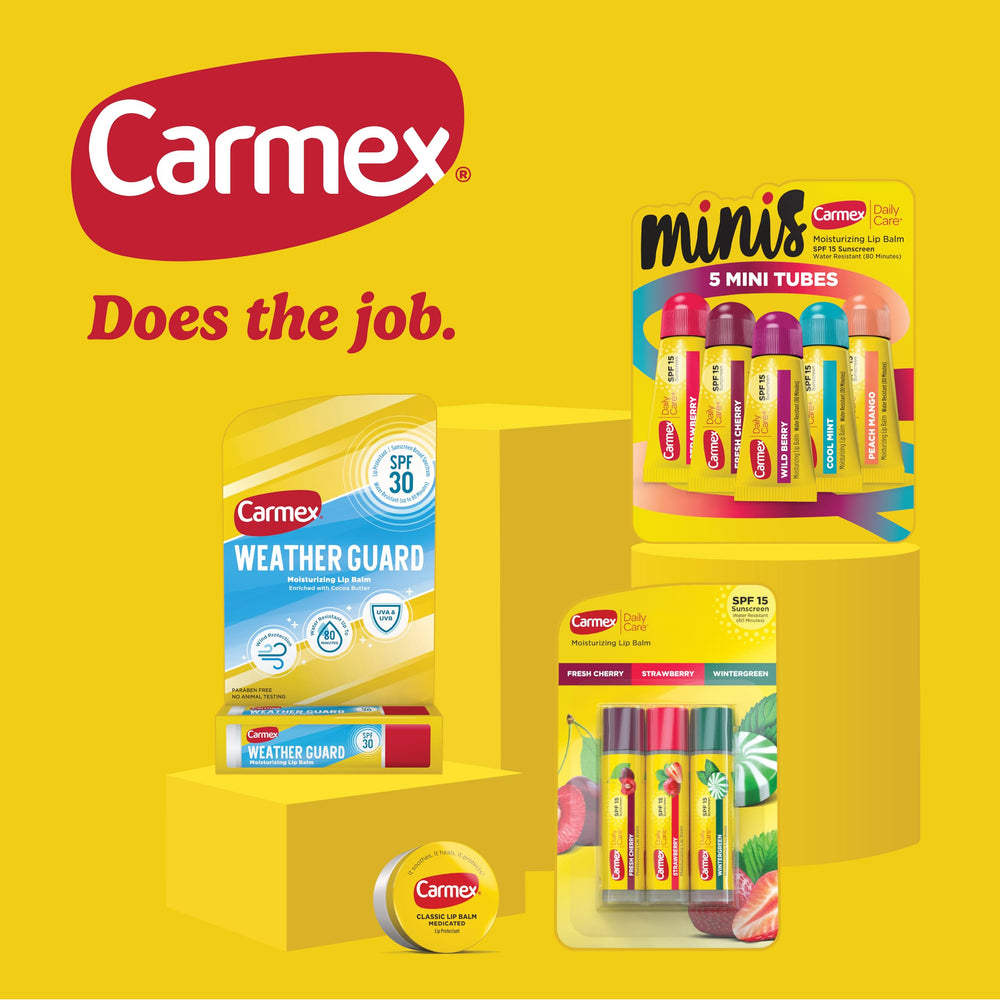 Carmex Classic Medicated Lip Balm Stick SPF 15 on-table with packaging for travel.