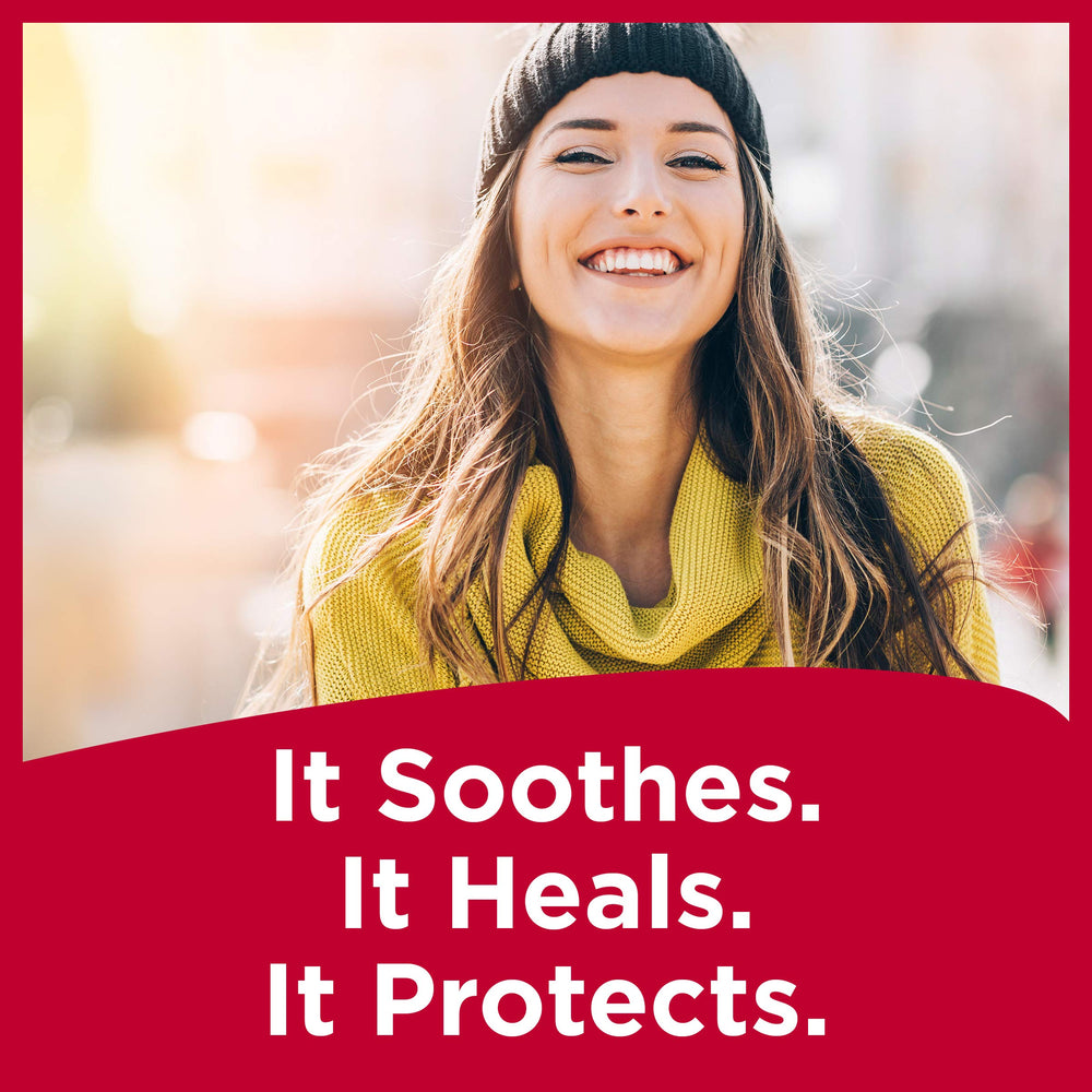 Carmex lip balm application on lips demonstrates smooth glide for dry lips.