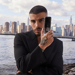 Carolina Herrera 212VIP Black night-out ambience conveys energetic, magnetic mood.
