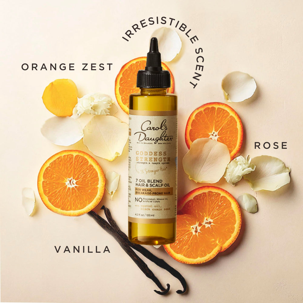 Curly hair gleams after using Goddess Strength oil.