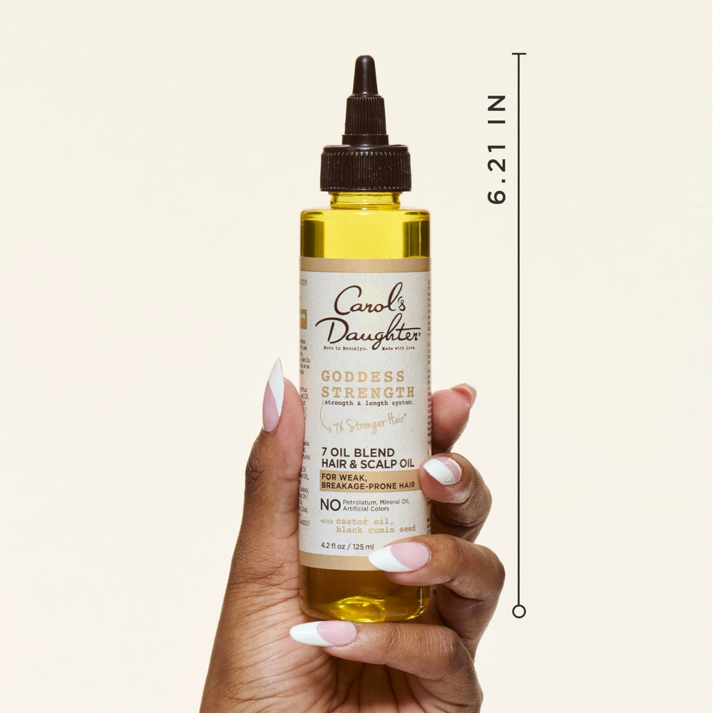 Close-up of Goddess Strength oil adds shine to curls.