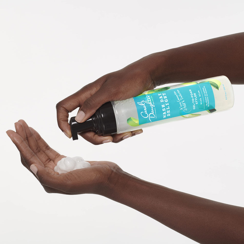 Frizz-free finish with Carol's Daughter Wash Day Delight on shiny curls