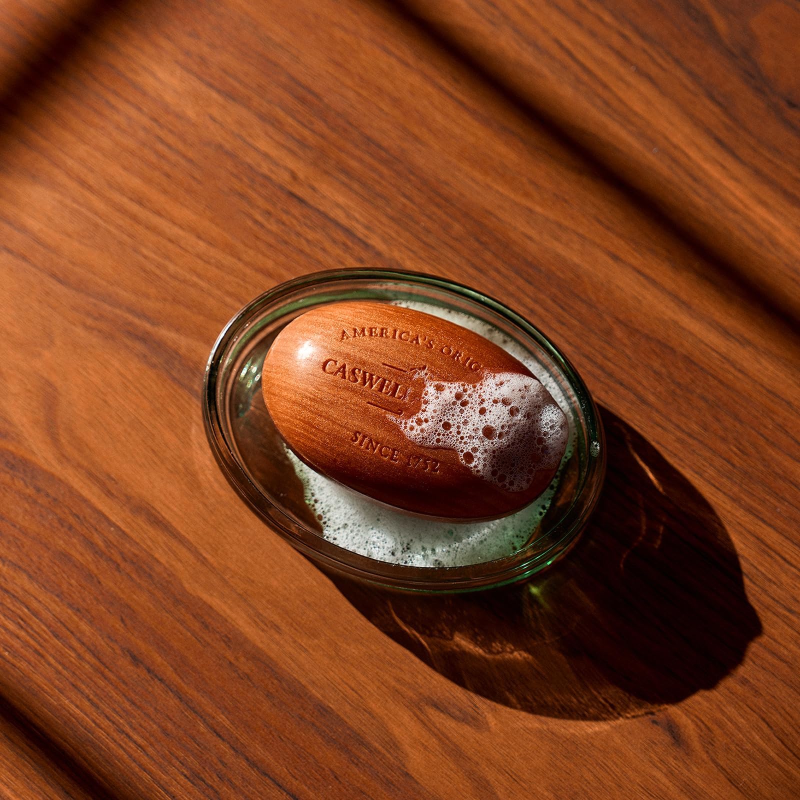 Caswell-Massey Heritage Woodgrain Sandalwood fragrance note highlighted with warm aroma.