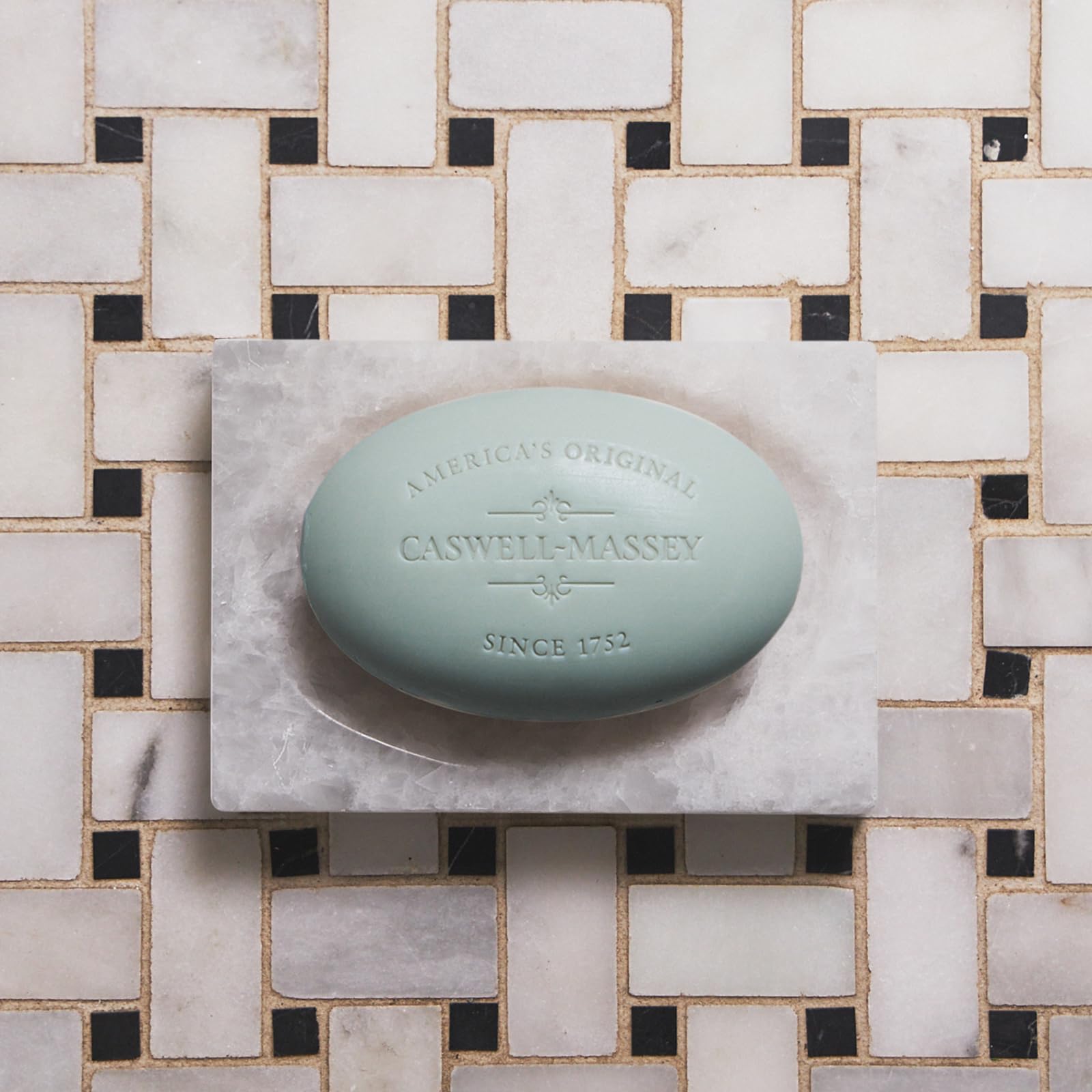 Caswell-Massey Jockey Club soap lathering during shower, luxurious spread.
