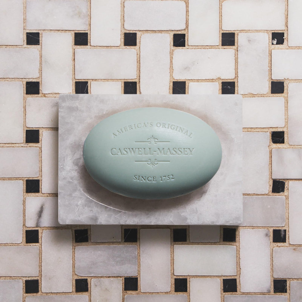 Caswell-Massey Jockey Club soap lathering during shower, luxurious spread.