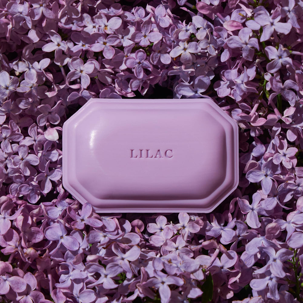Caswell-Massey Lilac Bar Soap close-up texture emphasizes triple-milled quality.