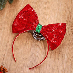 Catery Santa headband red on model for holiday party look.