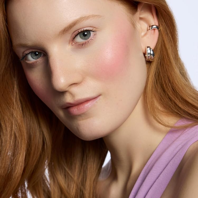 Catrice Blush Affair powder brush swirls to add depth and warmth